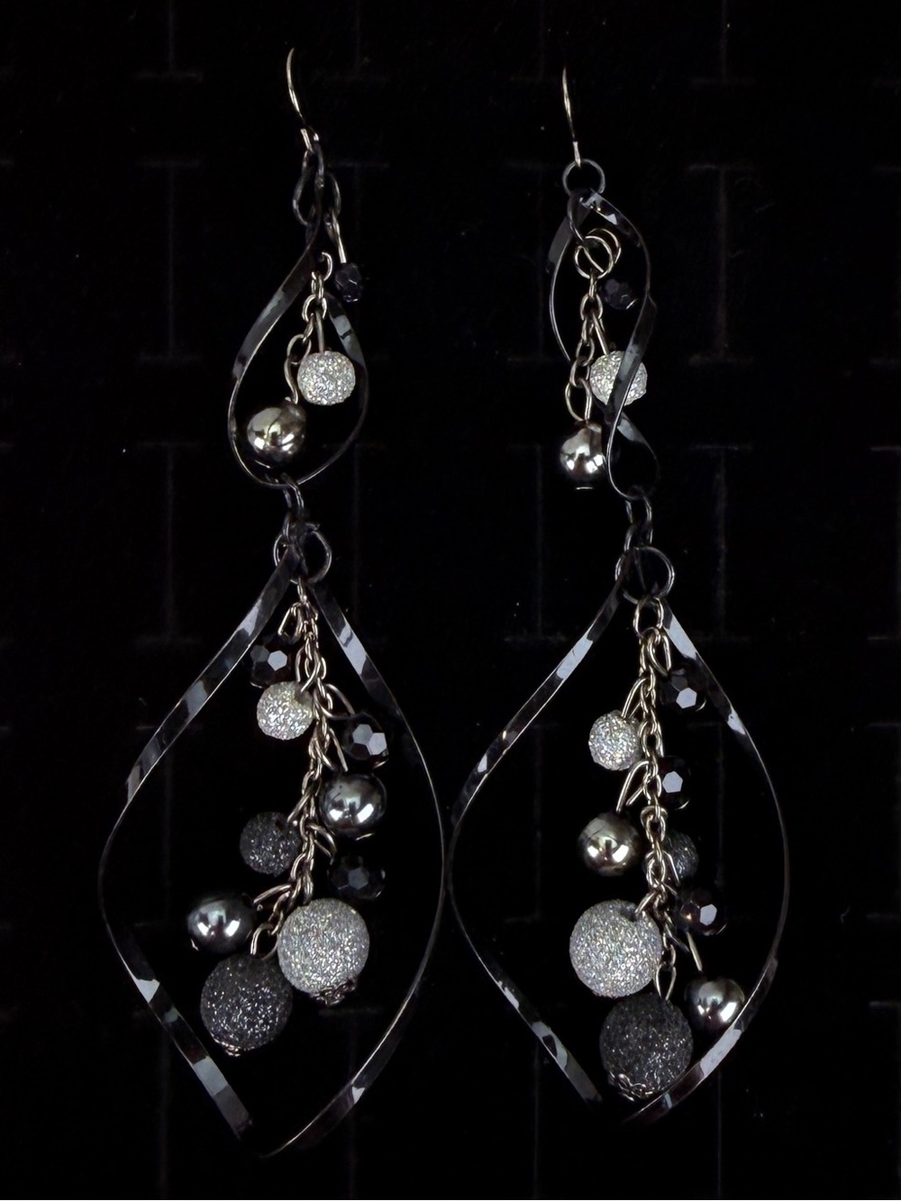 Pretty interesting lightweight black Silvertone beaded long pierced earrings